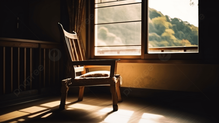 An empty wooden chair sitting in a sunlit room, symbolizing grief, solitude, and the clarity of Maharishi Gautam's Nyaya philosophy.